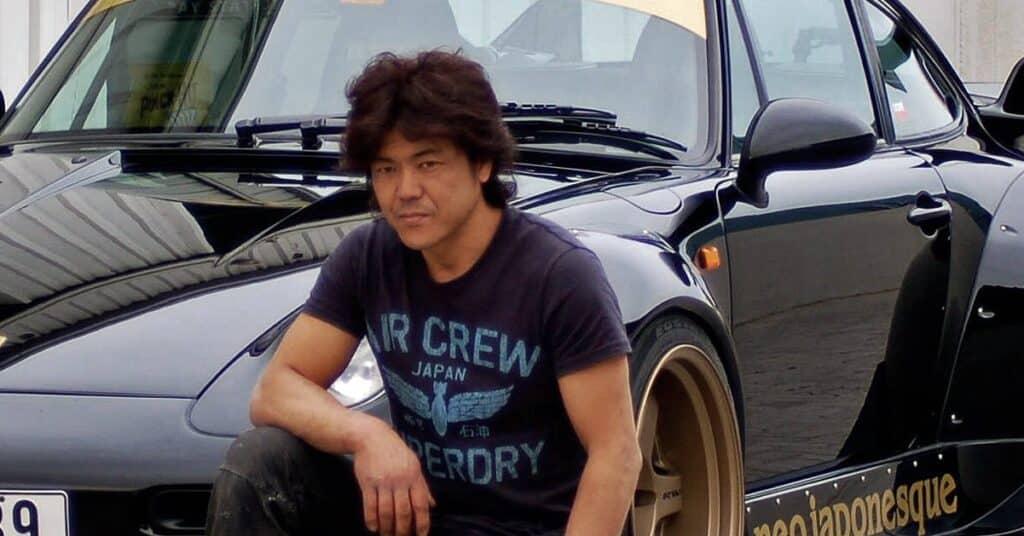 Akira Nakai with his modified Porche